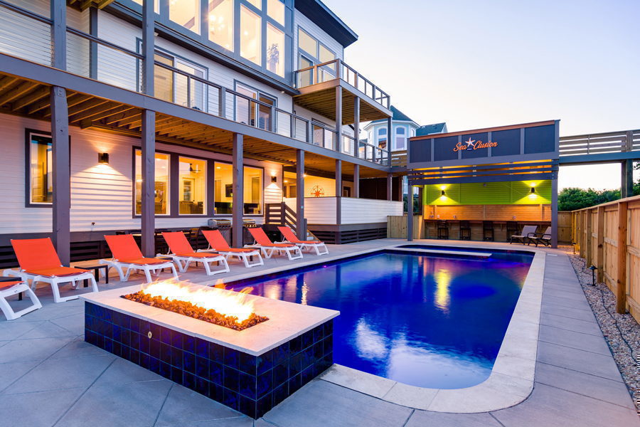 SAGA Realty & Construction, Inc. beautiful new construction. Fire by the pool.